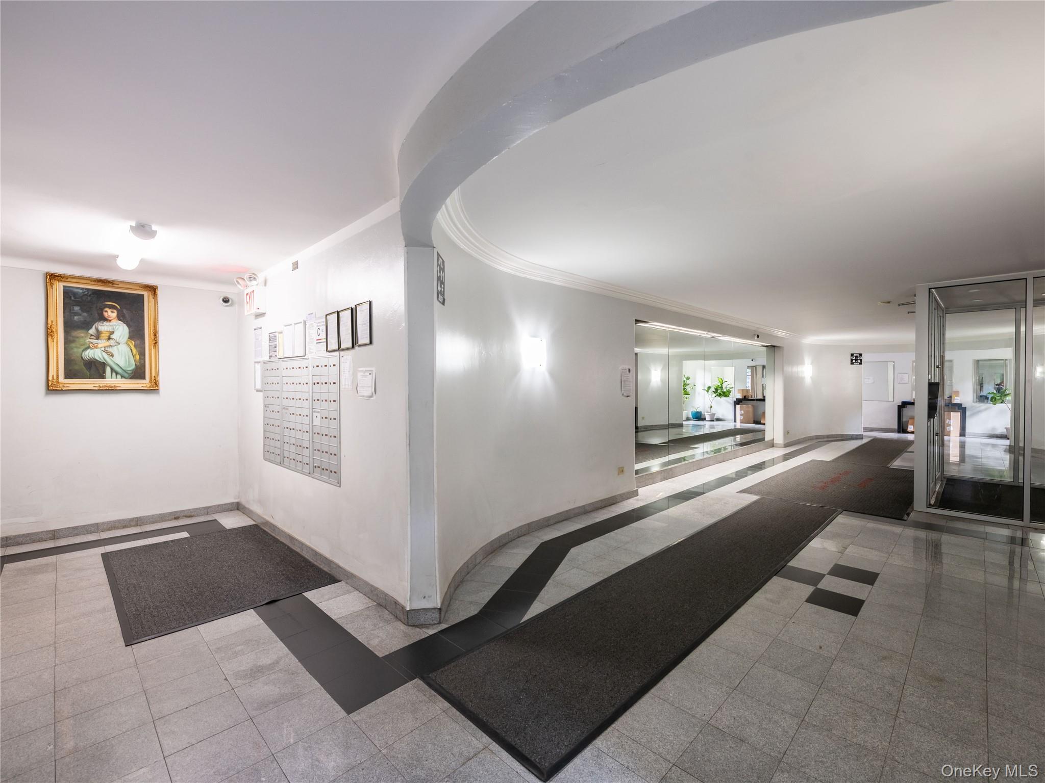 63-60 102nd Street, Unit D11 Queens, NY 11374 - Photo 2 of 21 a living room with furniture