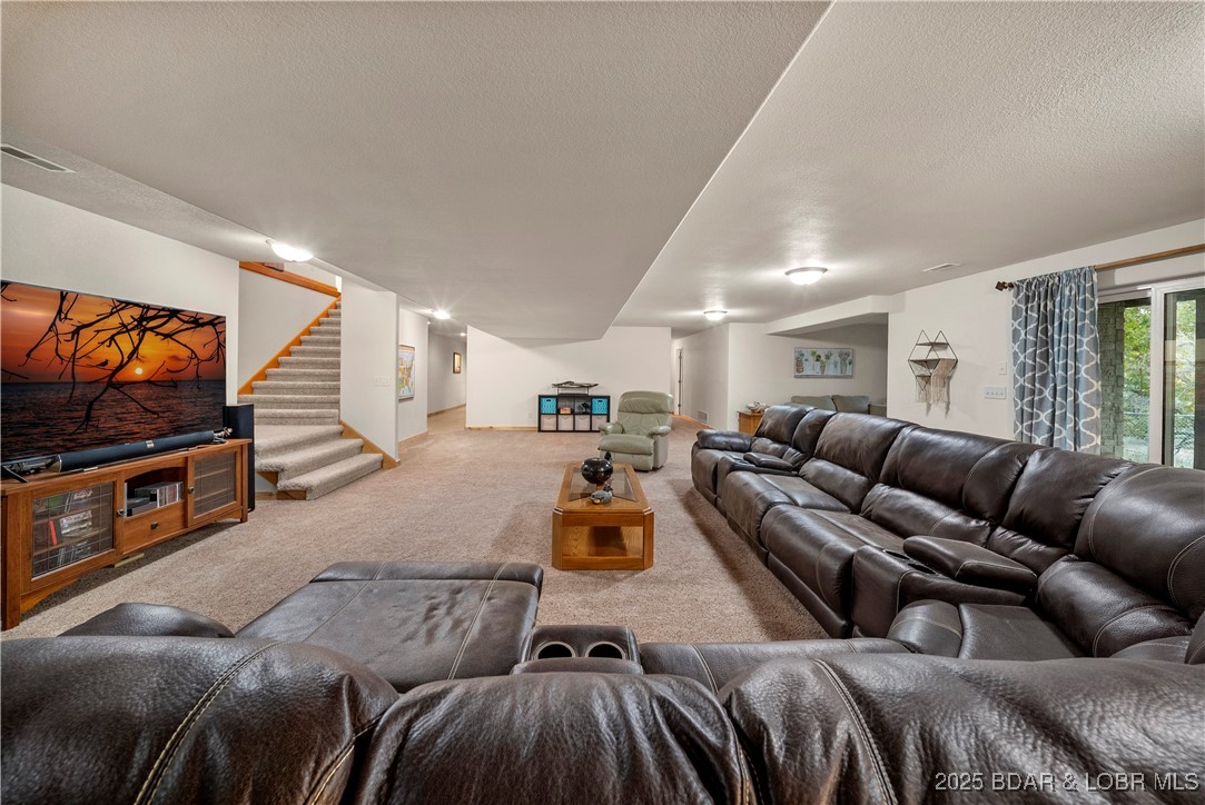 14613 Old Marvin Road Versailles, MO 65084 - Photo 39 of 73 Main House Lower Level Entertaining Space