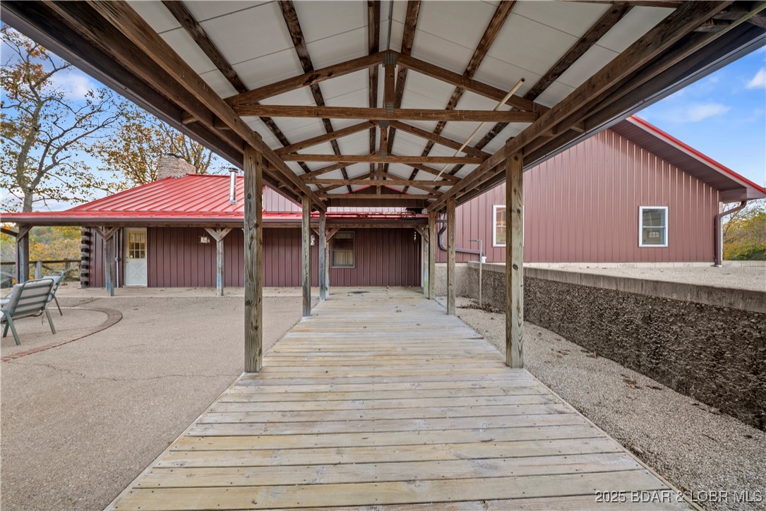 14613 Old Marvin Road Versailles, MO 65084 - Photo 10 of 73 Walkway Between Home and Garage/Trophy Room