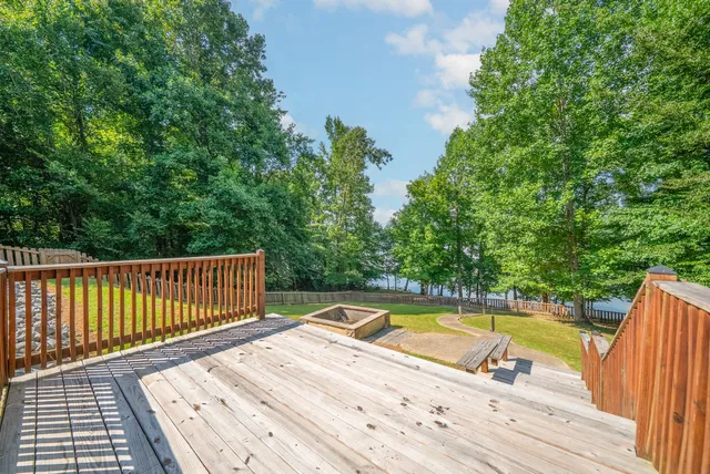 a view of a swimming pool with an outdoor space and seating area