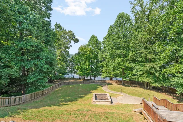 a view of a swimming pool with an outdoor space