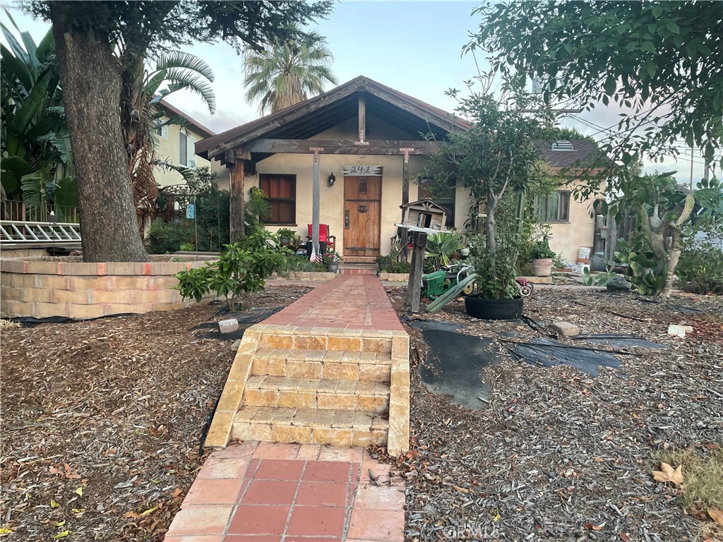 241 Thompson Avenue Glendale, CA 91201 - Photo 1 of 1 a front view of a house with garden