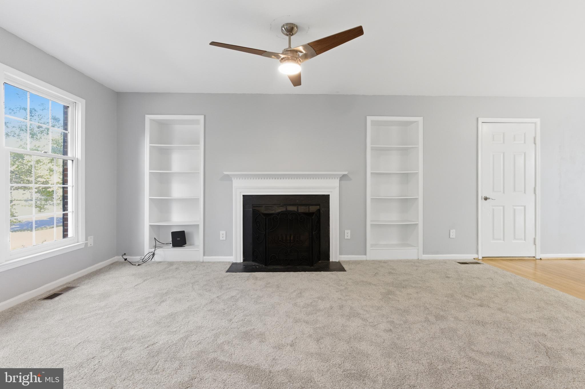 13601 Pendleton Street Fort Washington, MD 20744 - Photo 18 of 50 an empty room with windows and fireplace