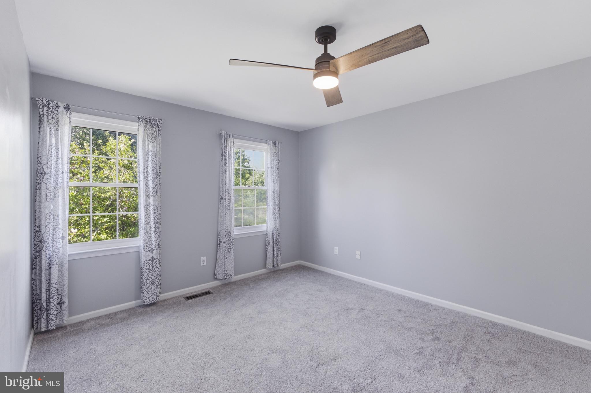 13601 Pendleton Street Fort Washington, MD 20744 - Photo 25 of 50 wooden floor in an empty room with a window