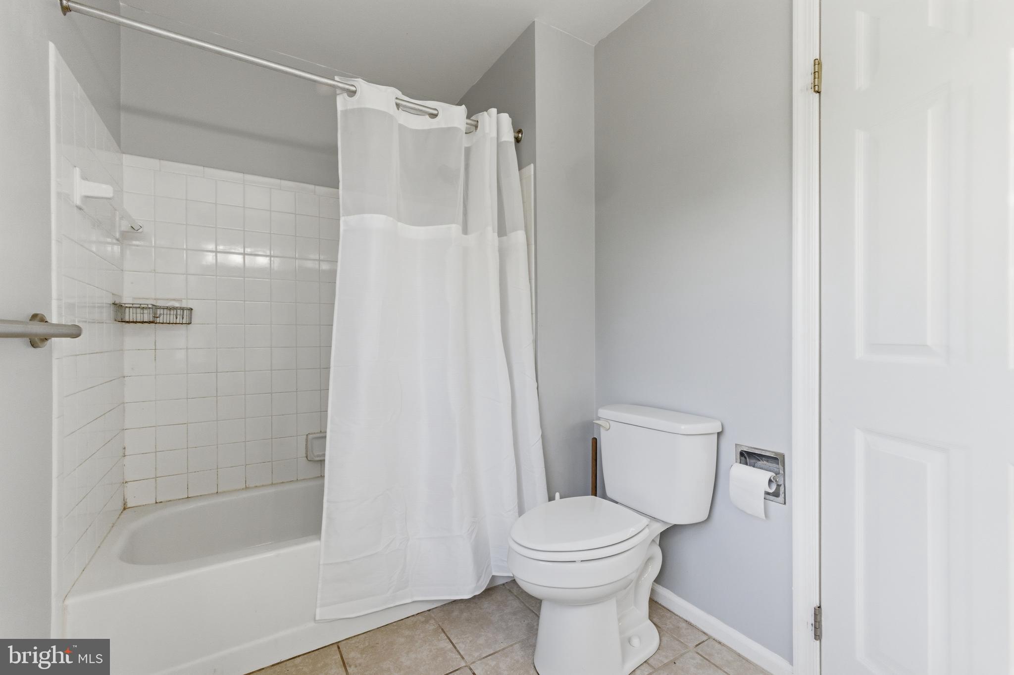 13601 Pendleton Street Fort Washington, MD 20744 - Photo 27 of 50 a bathroom with a shower and a toilet