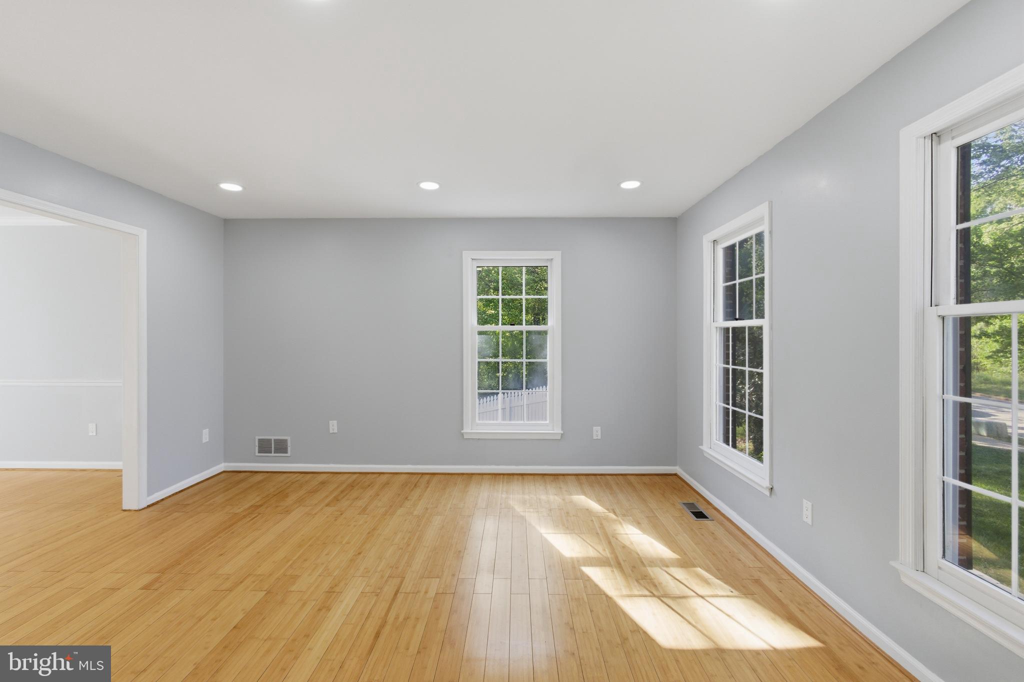 13601 Pendleton Street Fort Washington, MD 20744 - Photo 7 of 50 a view of empty room with wooden floor and fan