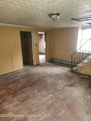 a view of a livingroom with an empty space