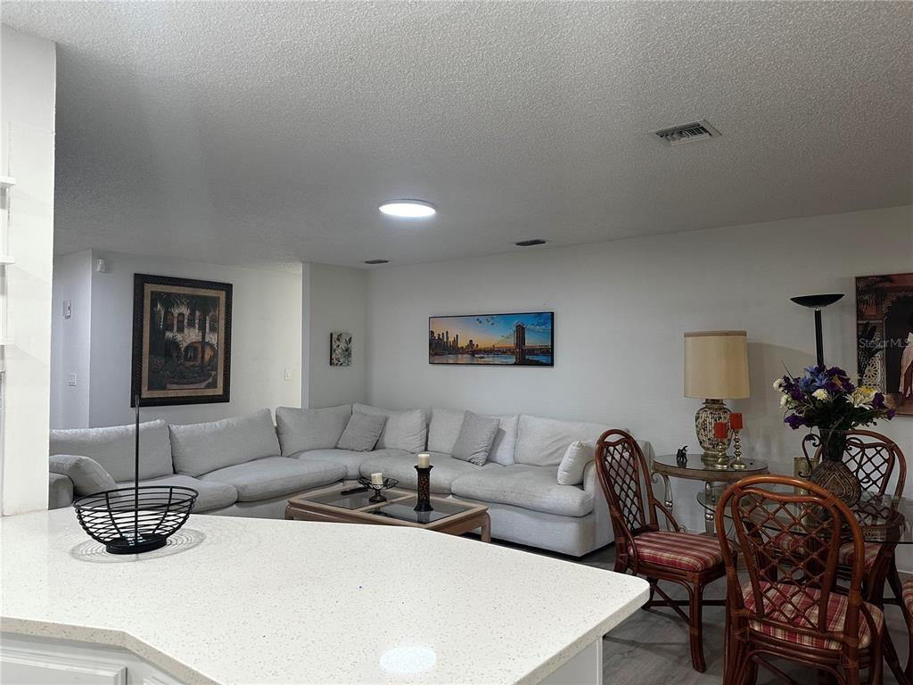 5144 Pine Tree Lane Wesley Chapel, FL 33543 - Photo 5 of 13 a living room with furniture