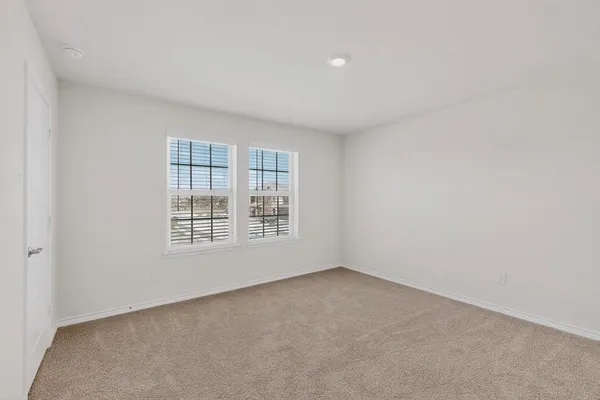 an empty room with a window