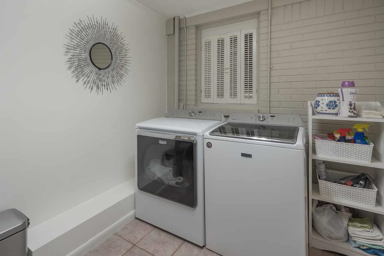 154 North Rose Road Memphis, TN 38117 - Photo 20 of 23 a utility room with dryer and washer