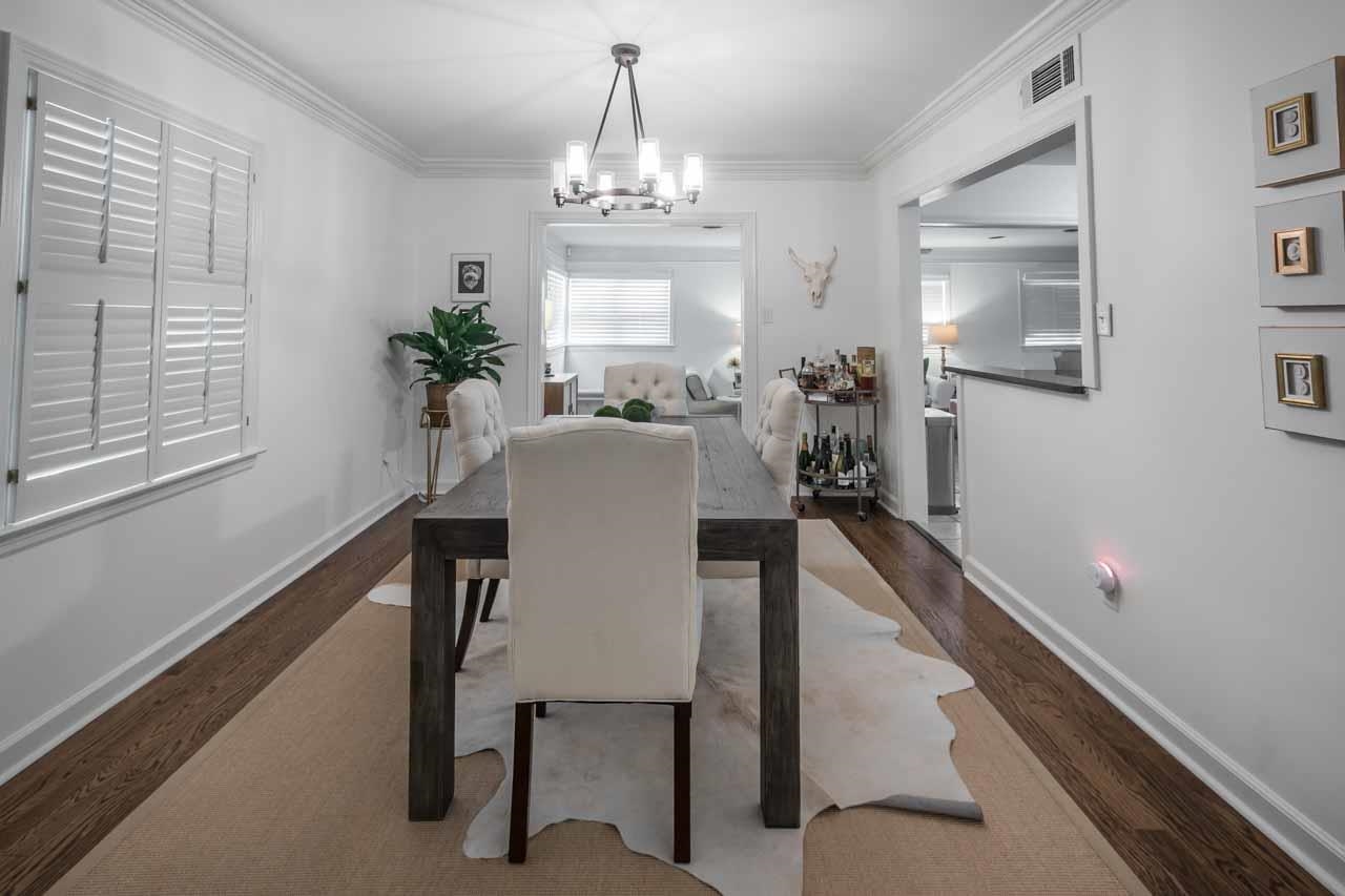 154 North Rose Road Memphis, TN 38117 - Photo 5 of 23 a view of a dining room with furniture and a chandelier