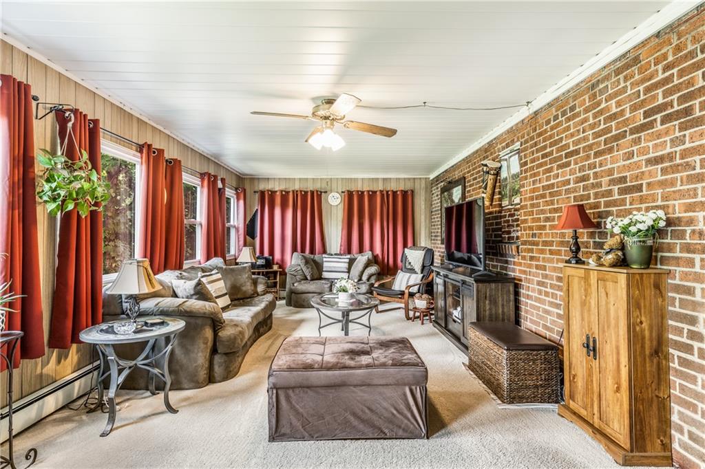 351 Goldsmith Road Pittsburgh, PA 15237 - Photo 13 of 25 a living room with furniture and a large window