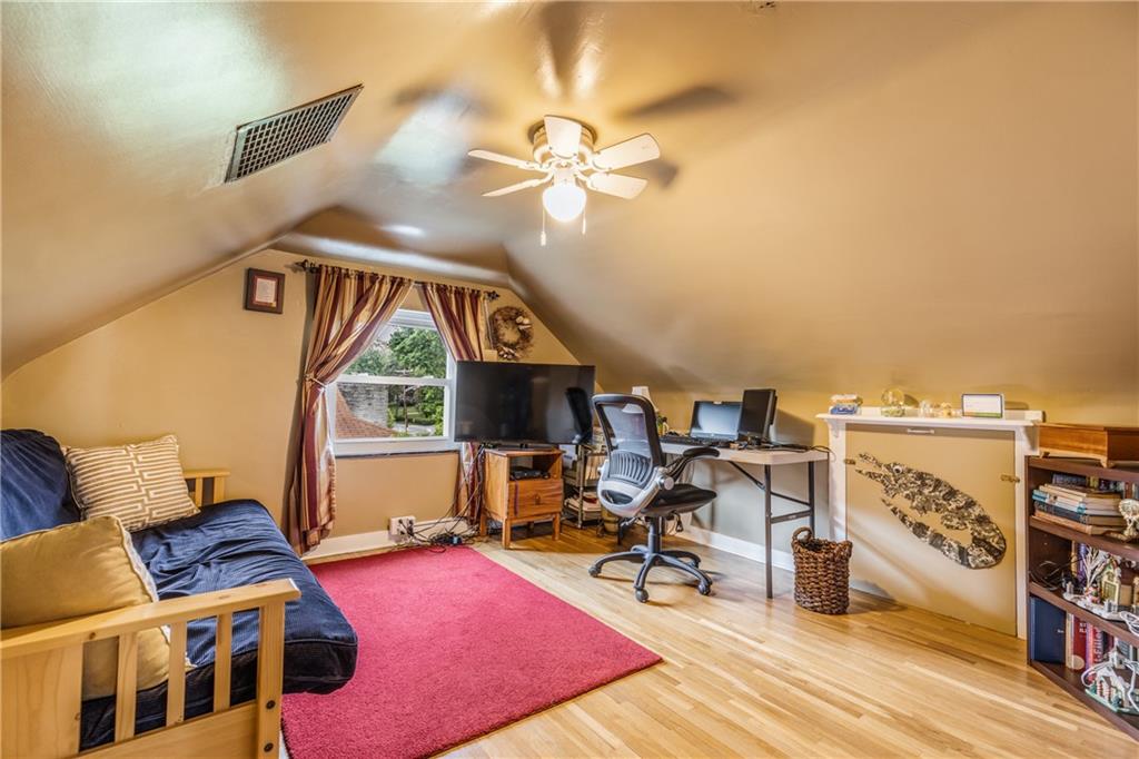 351 Goldsmith Road Pittsburgh, PA 15237 - Photo 20 of 25 a living room with furniture a rug and a chandelier