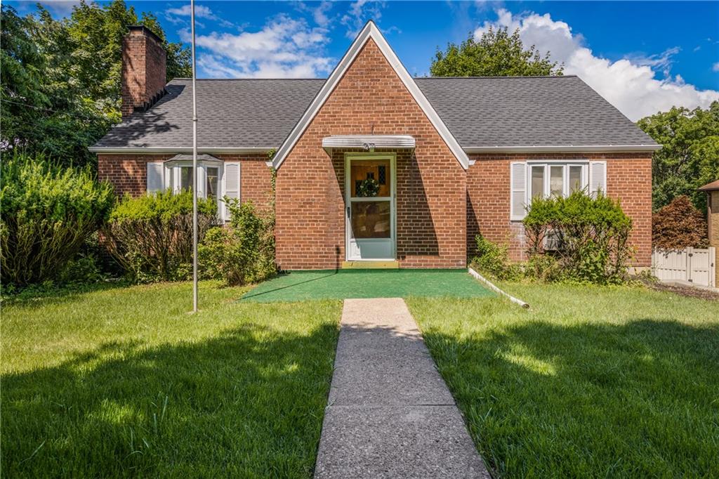 351 Goldsmith Road Pittsburgh, PA 15237 - Photo 3 of 25 a front view of a house with garden