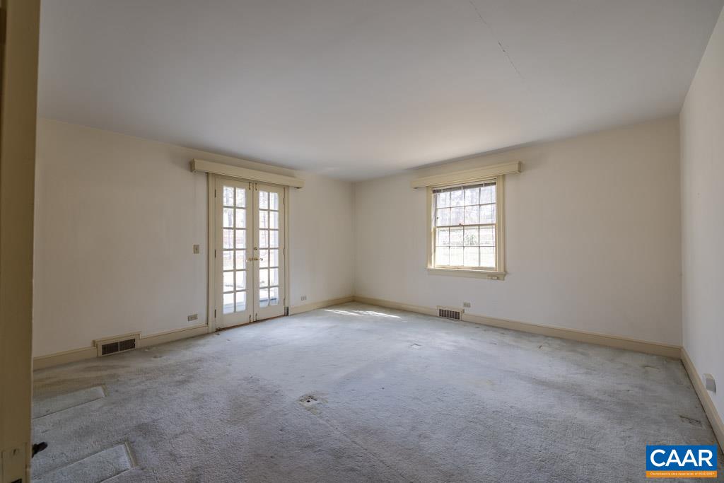 1644 St Annes Road Charlottesville, VA 22901 - Photo 19 of 58 an empty room with windows