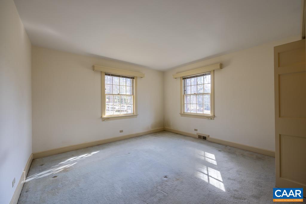 1644 St Annes Road Charlottesville, VA 22901 - Photo 23 of 58 an empty room with windows