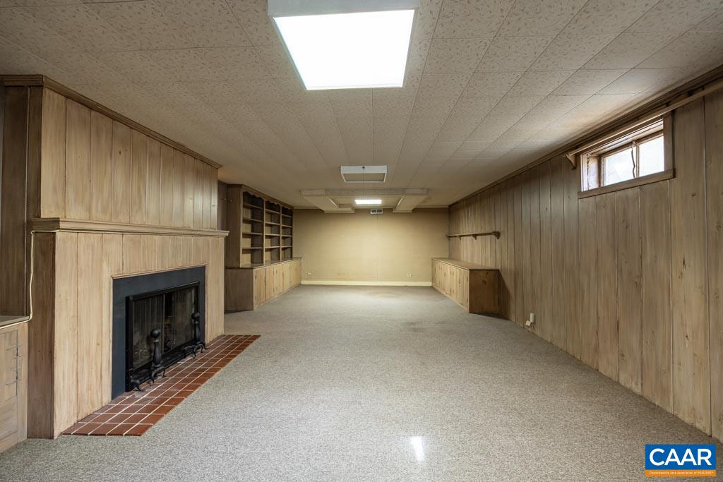 1644 St Annes Road Charlottesville, VA 22901 - Photo 29 of 58 a view of an empty room with a fireplace