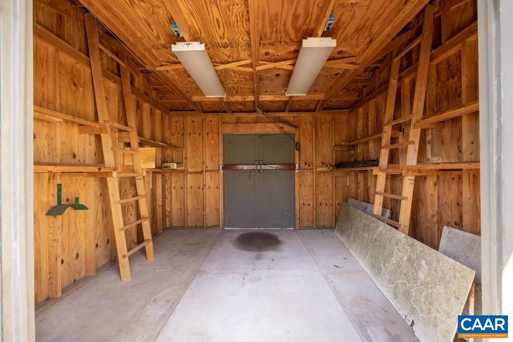 1644 St Annes Road Charlottesville, VA 22901 - Photo 39 of 58 a view of a room with racks on the wall