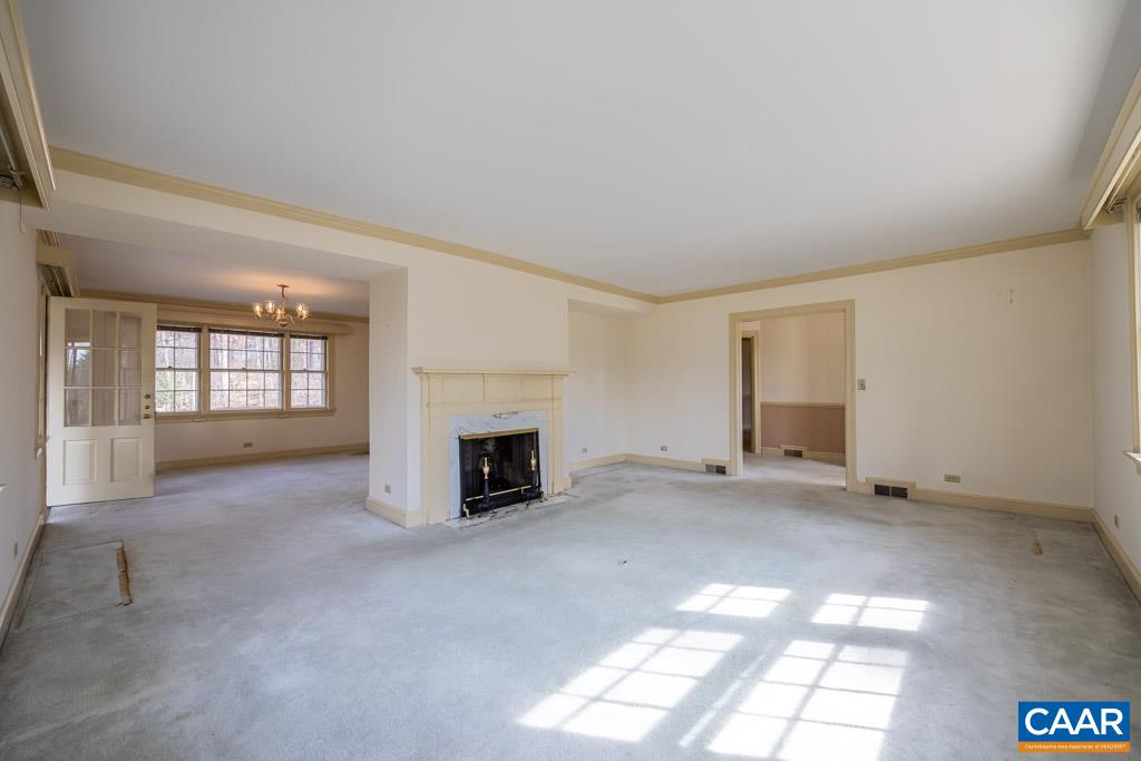 1644 St Annes Road Charlottesville, VA 22901 - Photo 9 of 58 a view of empty room with a fireplace
