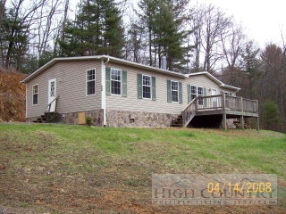 204 Allens Ridge Road West Jefferson, NC 28694 - Photo 1 of 1 a view of a house with a yard