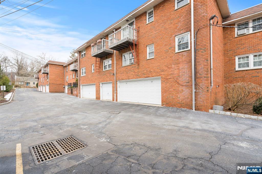 39 Harrison Avenue, Unit 8 Montclair, NJ 07042 - Photo 19 of 19 a view of a house with a street