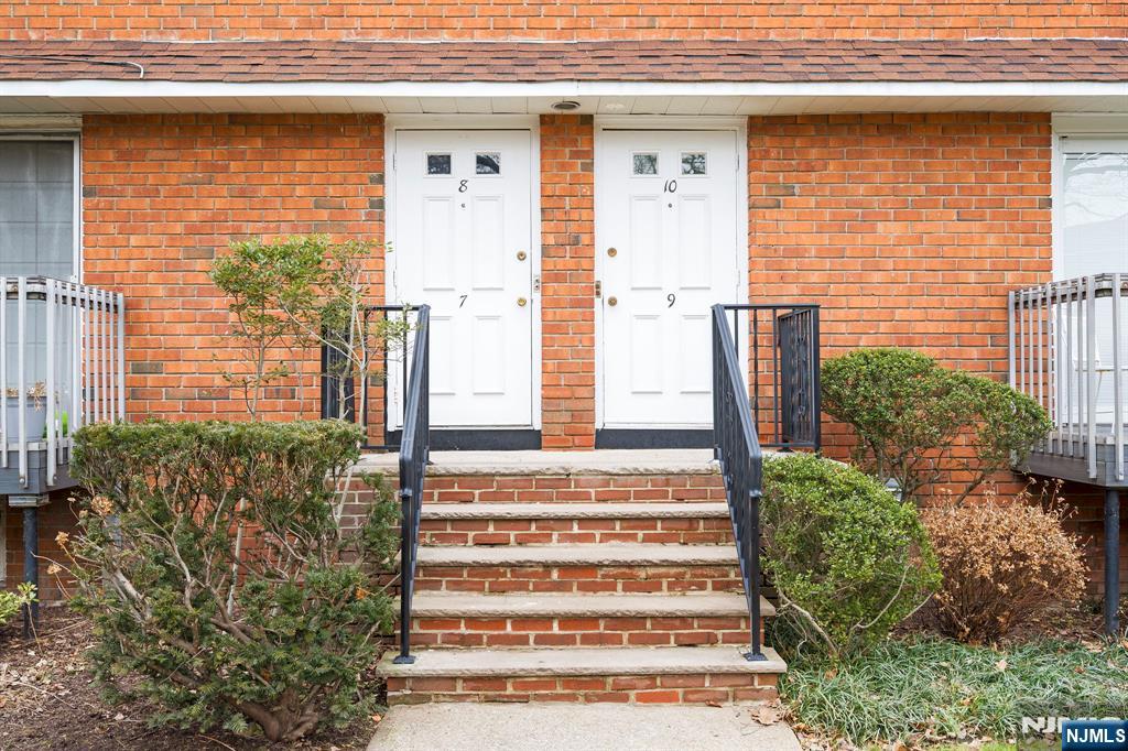 39 Harrison Avenue, Unit 8 Montclair, NJ 07042 - Photo 3 of 19 a front view of a house with a garden