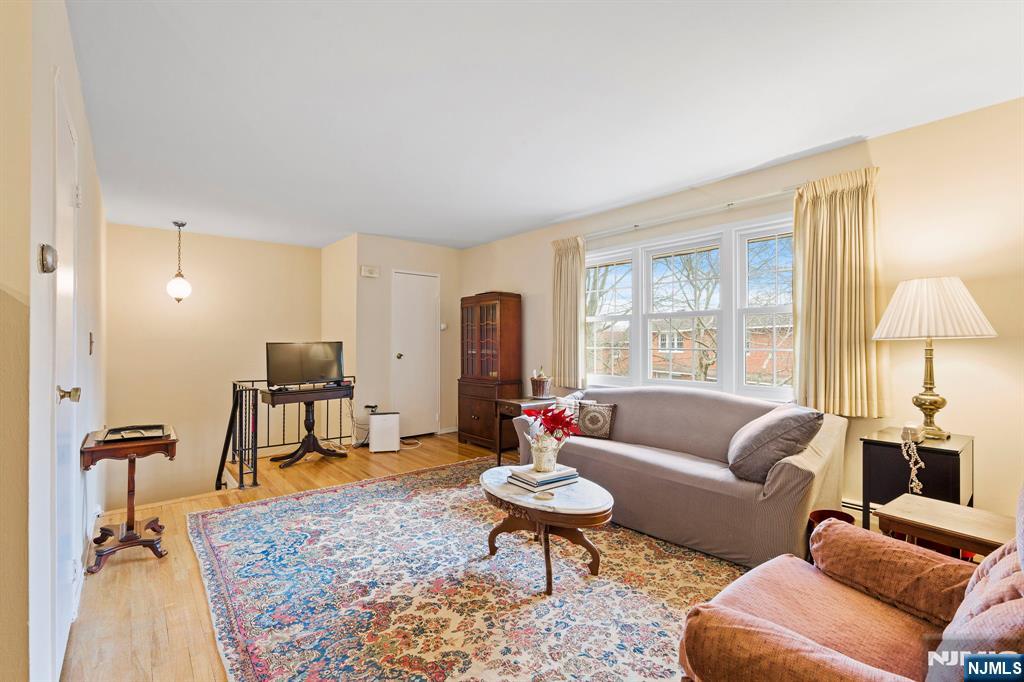 39 Harrison Avenue, Unit 8 Montclair, NJ 07042 - Photo 4 of 19 a living room with furniture and a window