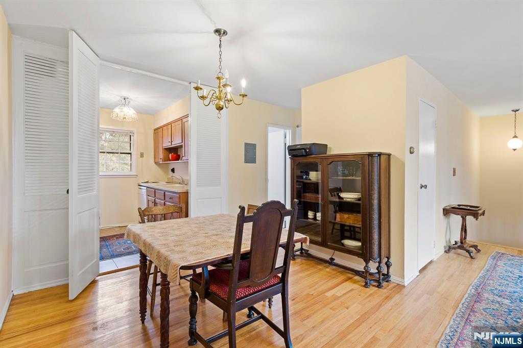 39 Harrison Avenue, Unit 8 Montclair, NJ 07042 - Photo 8 of 19 a view of a dining room with furniture and wooden floor