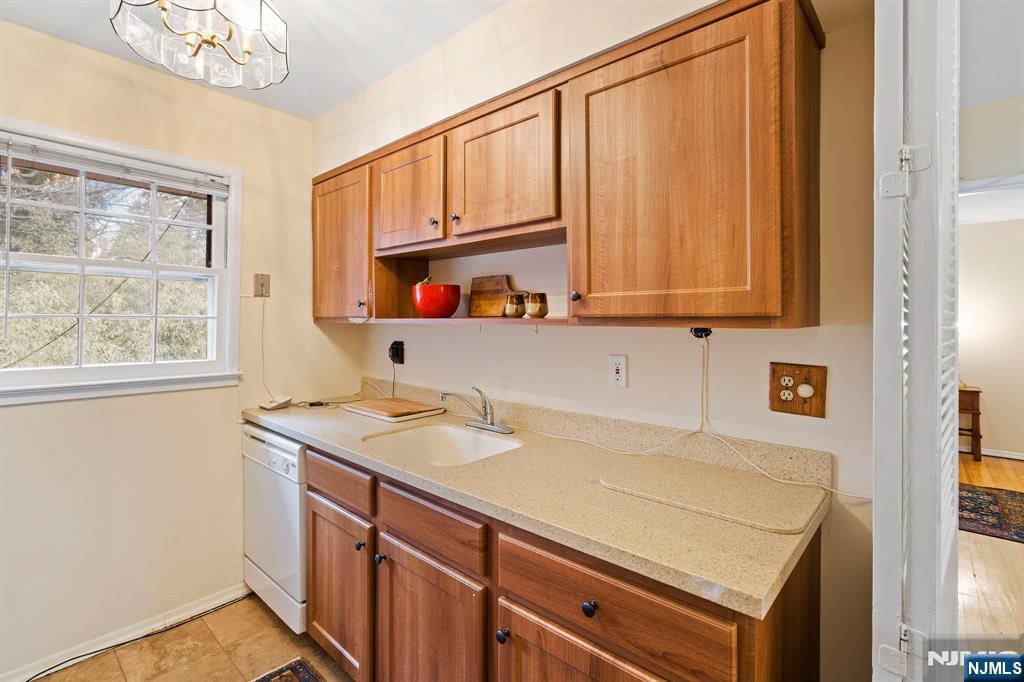 39 Harrison Avenue, Unit 8 Montclair, NJ 07042 - Photo 10 of 19 a view of a kitchen with appliances cabinets and a window
