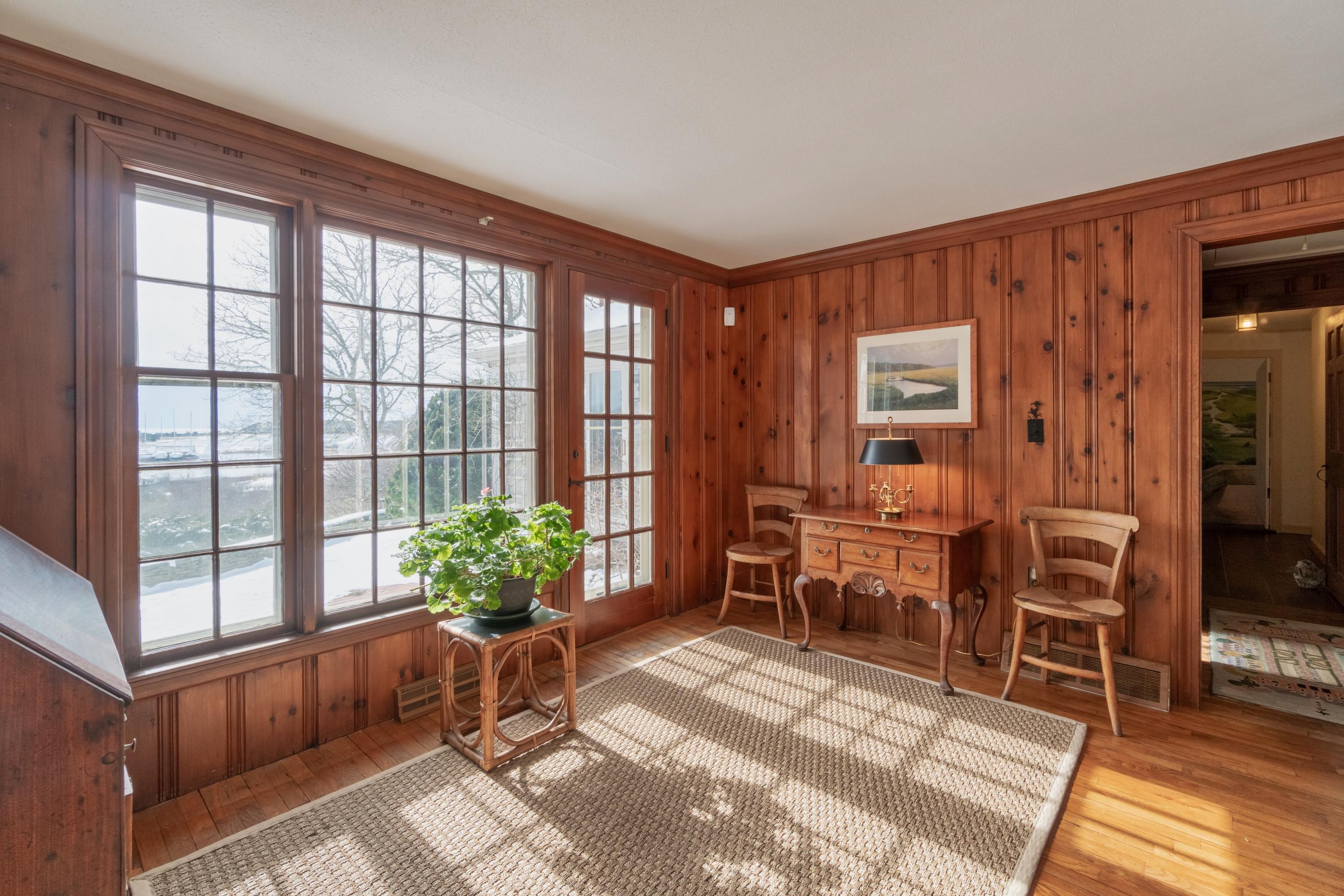 70 Inlet Road Chatham, MA 02633 - Photo 14 of 35 a living room with furniture and a potted plant