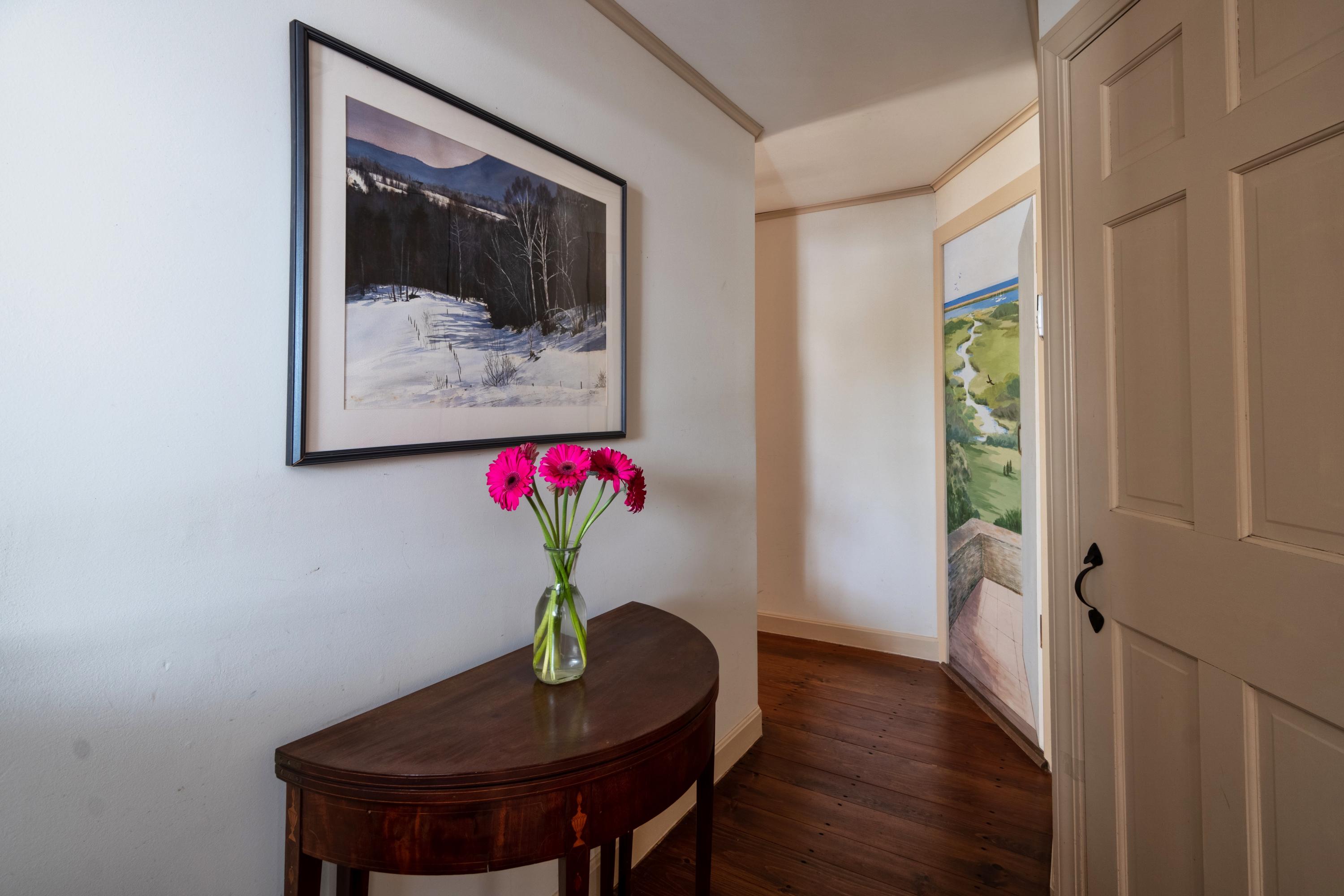 70 Inlet Road Chatham, MA 02633 - Photo 20 of 35 a view of a hallway with furniture and wooden floor