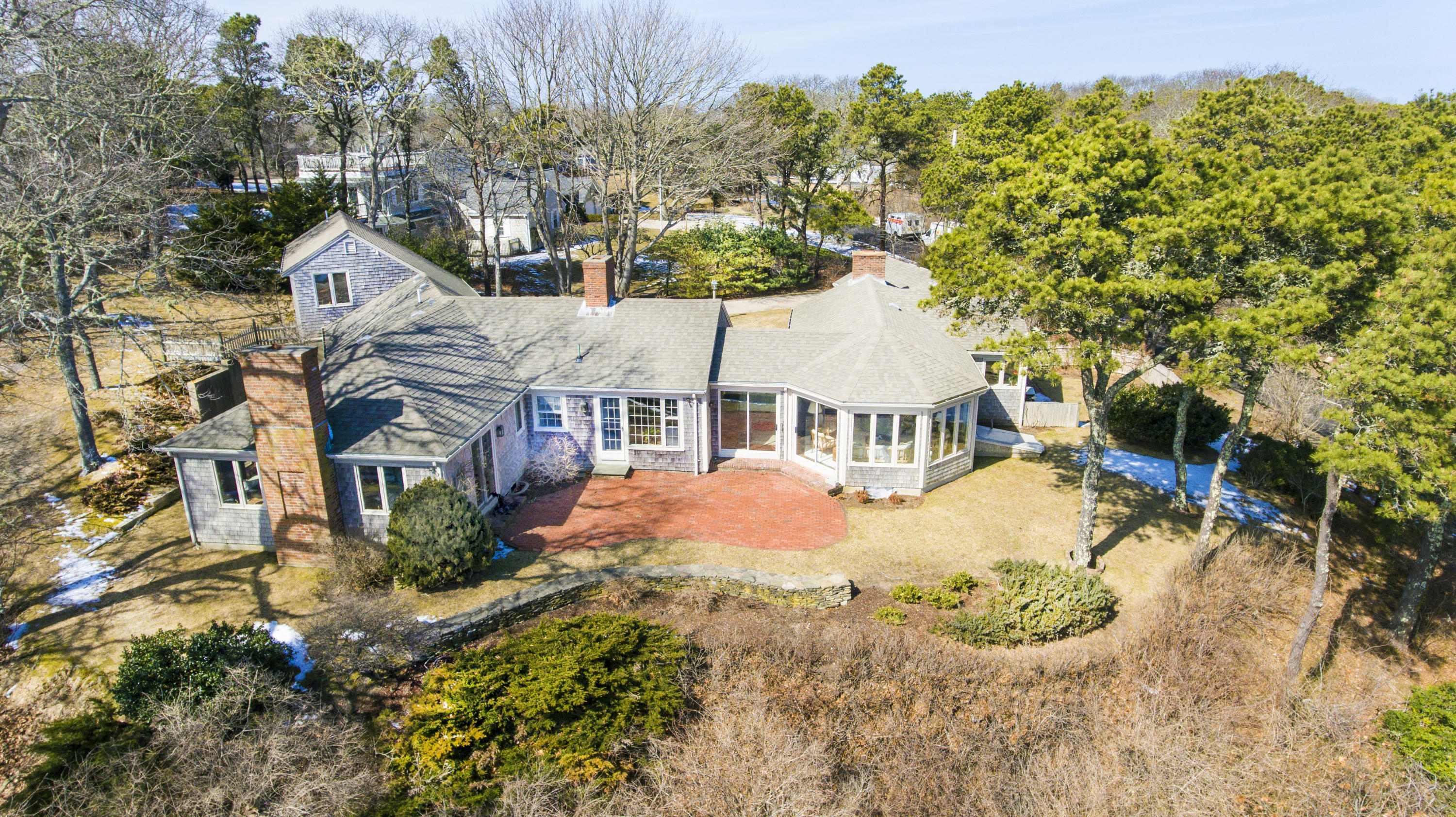 70 Inlet Road Chatham, MA 02633 - Photo 2 of 35 an aerial view of a house with swimming pool and large trees