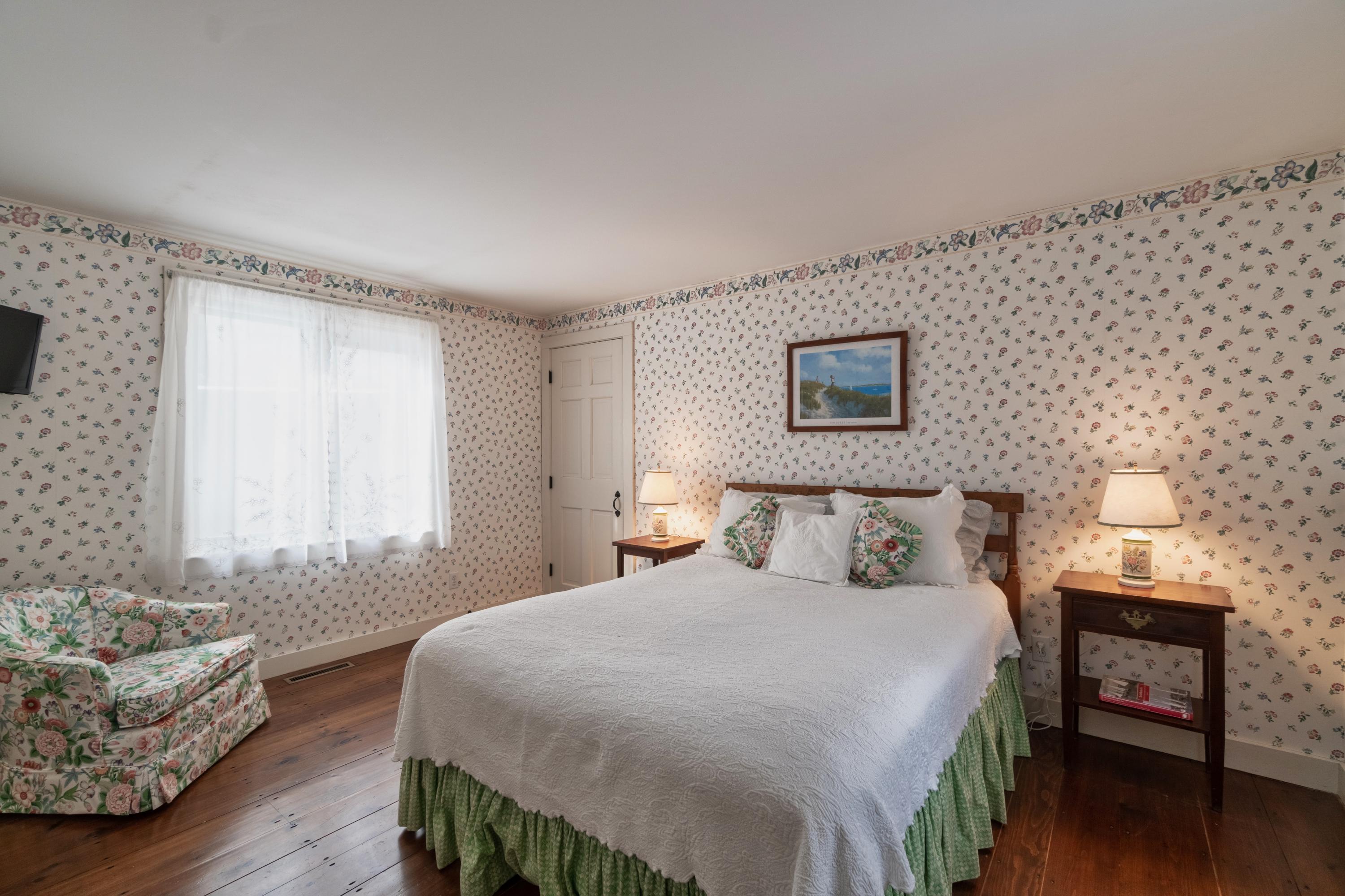 70 Inlet Road Chatham, MA 02633 - Photo 21 of 35 a bedroom with a bed and a couch