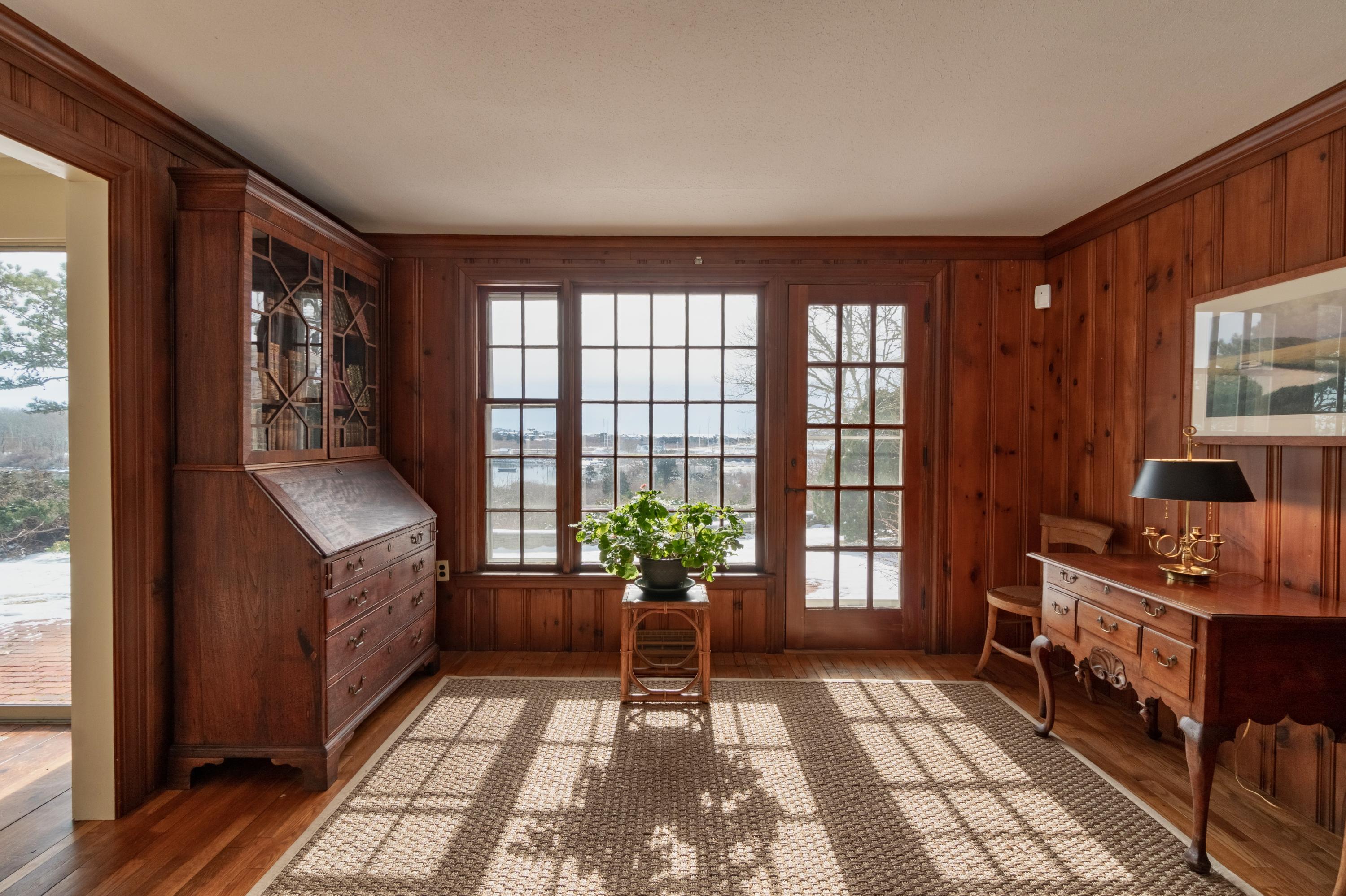 70 Inlet Road Chatham, MA 02633 - Photo 22 of 35 a living room with furniture and a potted plant