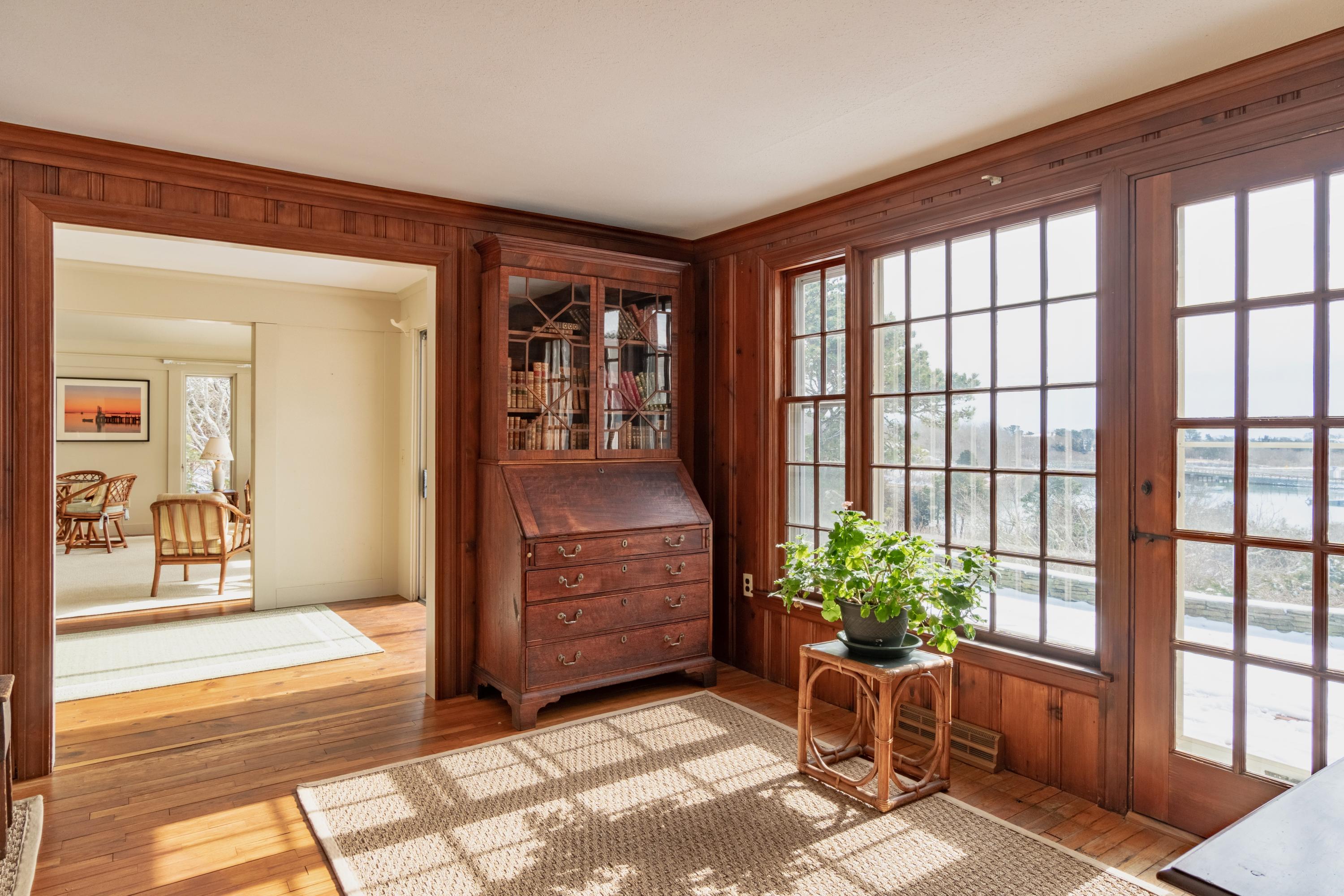 70 Inlet Road Chatham, MA 02633 - Photo 23 of 35 a living room with furniture and a potted plant