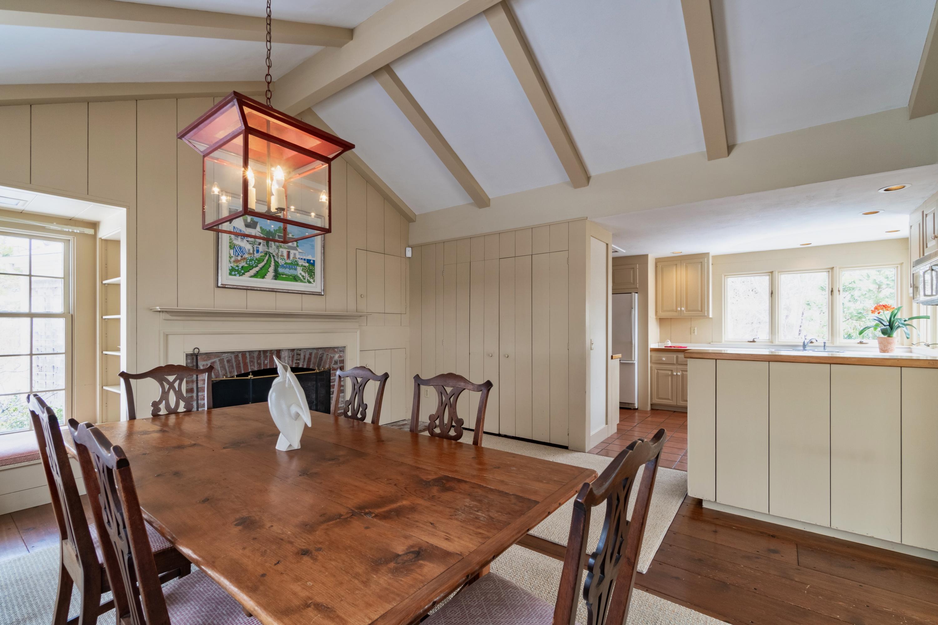 70 Inlet Road Chatham, MA 02633 - Photo 26 of 35 a view of a dining room with furniture and wooden floor