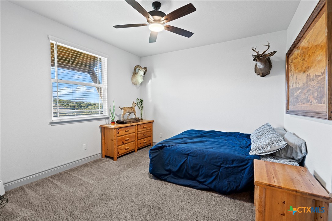 2807 Grimes Crossing Road Copperas Cove, TX 76522 - Photo 23 of 32 a bedroom with a bed and a window