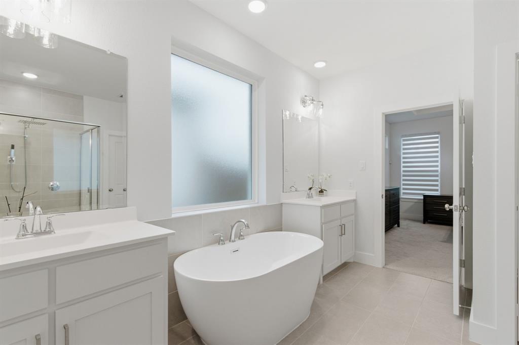 7217 Mantle Ridge Drive Fort Worth, TX 76179 - Photo 17 of 31 Primary en suite with freestanding tub, separate shower and dual vanities.