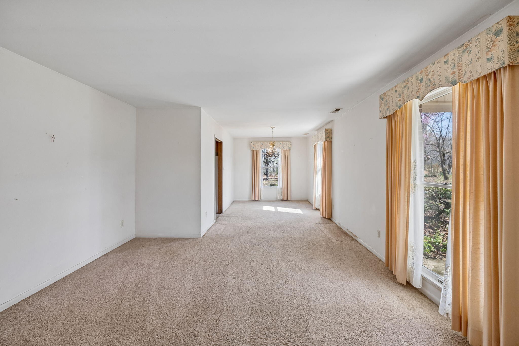 766 Bowling Alley Road Manchester, TN 37355 - Photo 10 of 57 a view of a livingroom with an empty space and a window