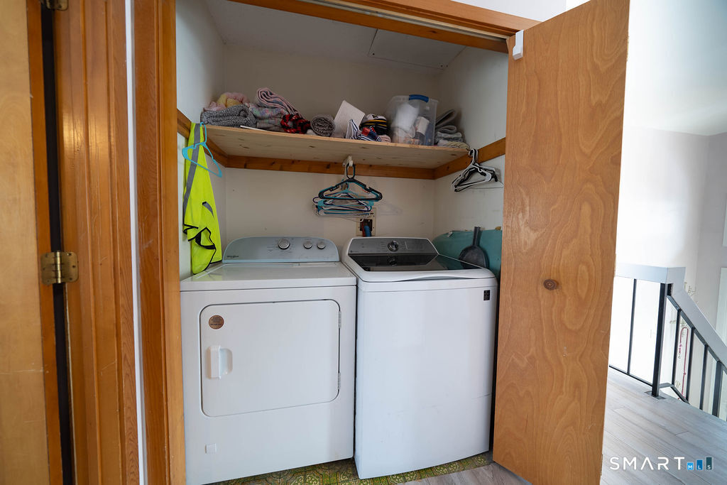 219 Twin Lakes Road, Unit A North Branford, CT 06471 - Photo 17 of 34 2nd Floor Laundry between bedrooms