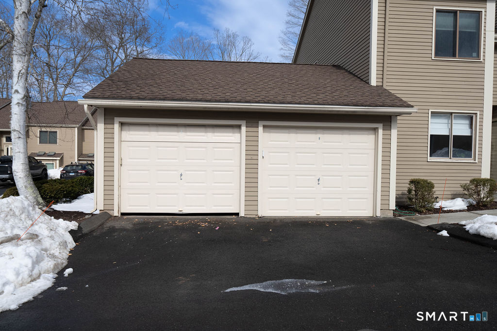 219 Twin Lakes Road, Unit A North Branford, CT 06471 - Photo 25 of 34 Left garage for 219A