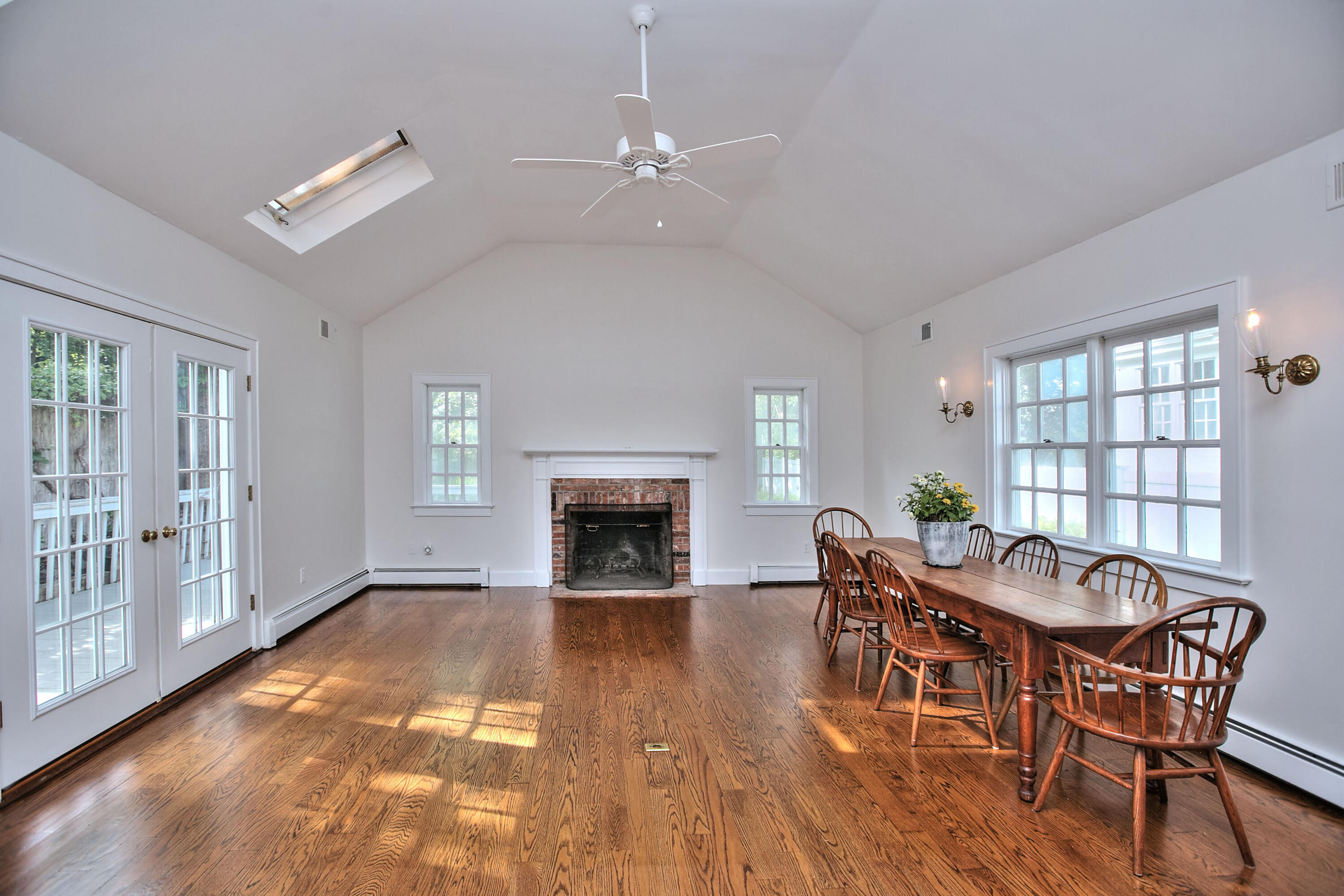 89 Richmond Hill Road New Canaan, CT 06840 - Photo 15 of 40 a view of a livingroom with furniture and a fireplace