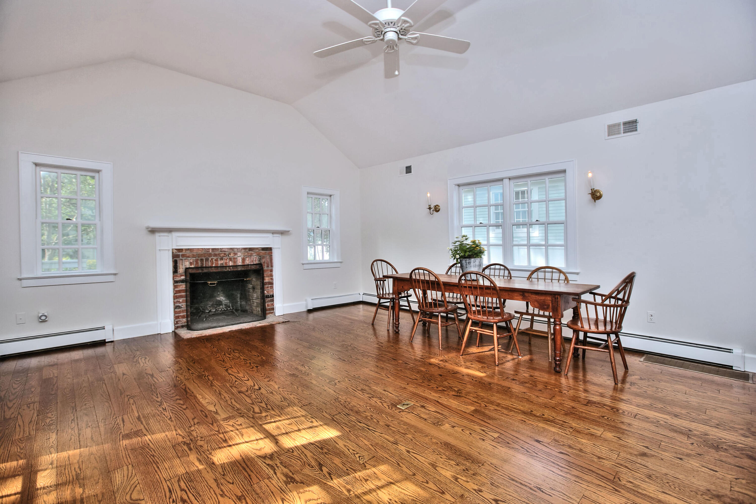 89 Richmond Hill Road New Canaan, CT 06840 - Photo 16 of 40 a view of a dining room with furniture and wooden floor