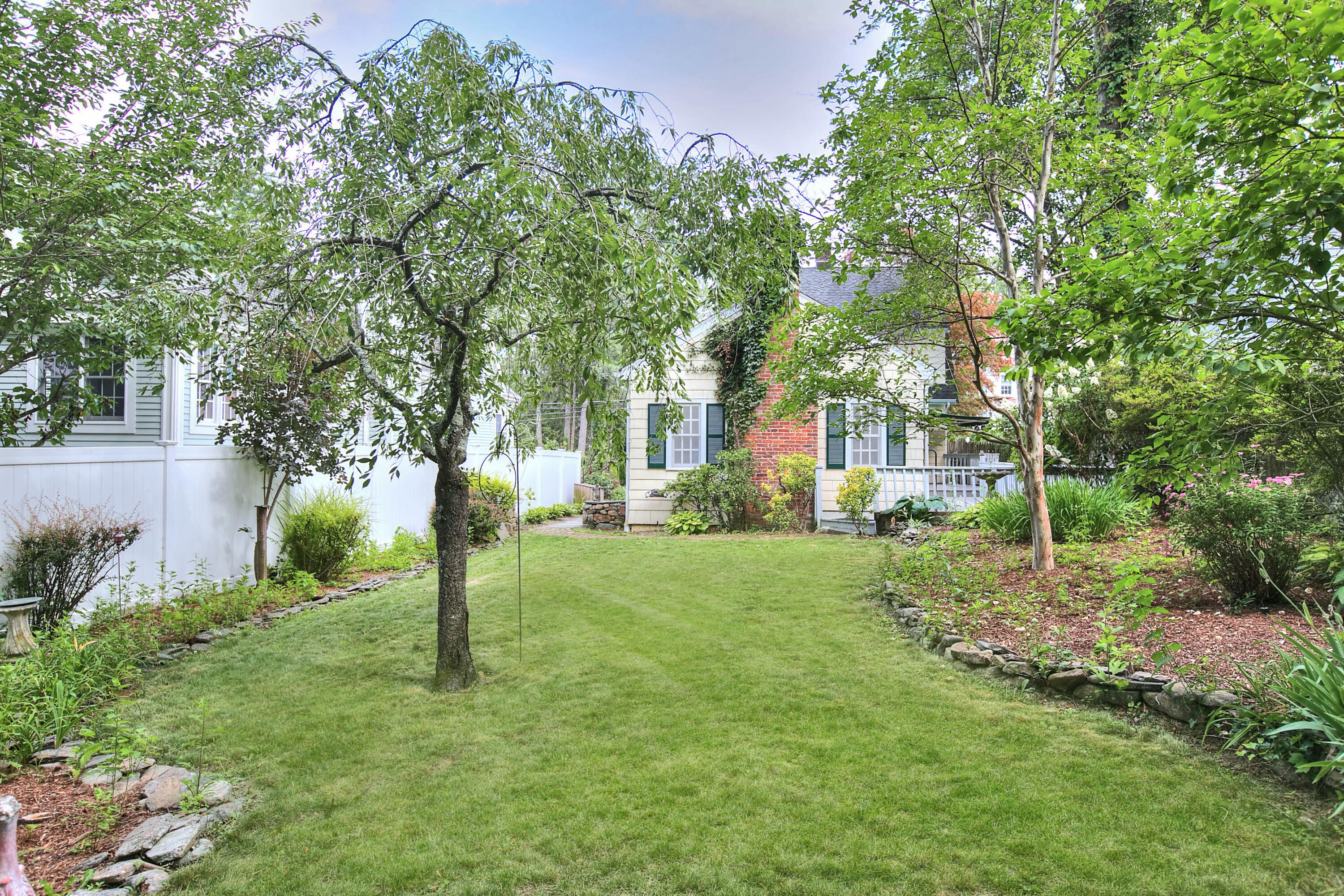 89 Richmond Hill Road New Canaan, CT 06840 - Photo 34 of 40 a view of a yard in front of house