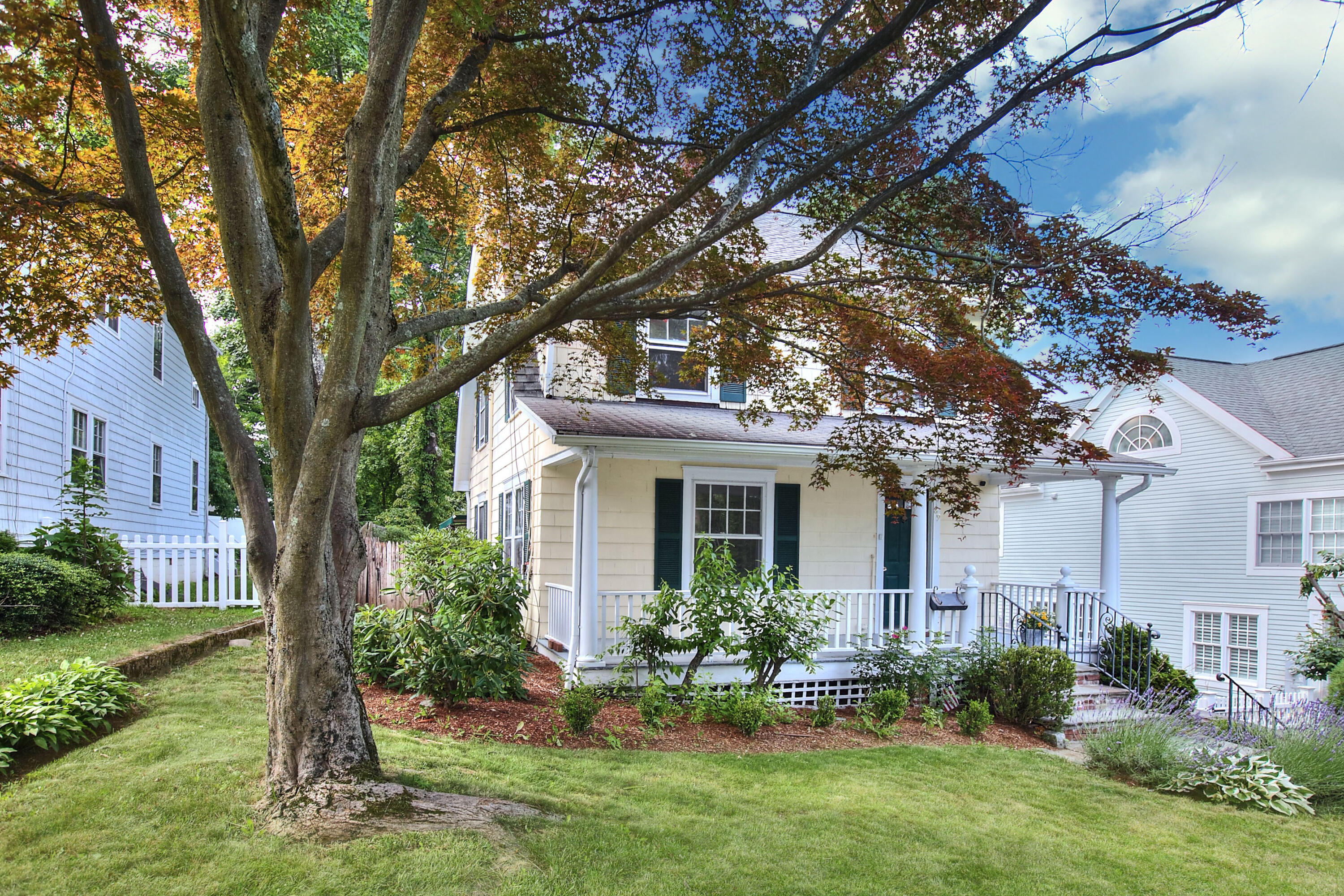 89 Richmond Hill Road New Canaan, CT 06840 - Photo 40 of 40 a front view of house with yard and green space
