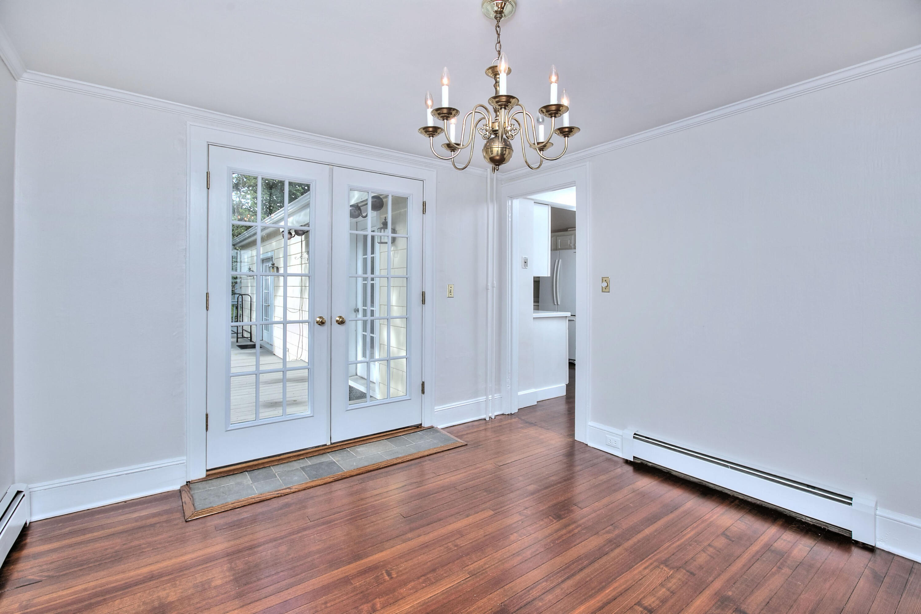 89 Richmond Hill Road New Canaan, CT 06840 - Photo 9 of 40 a view of a livingroom with wooden floor