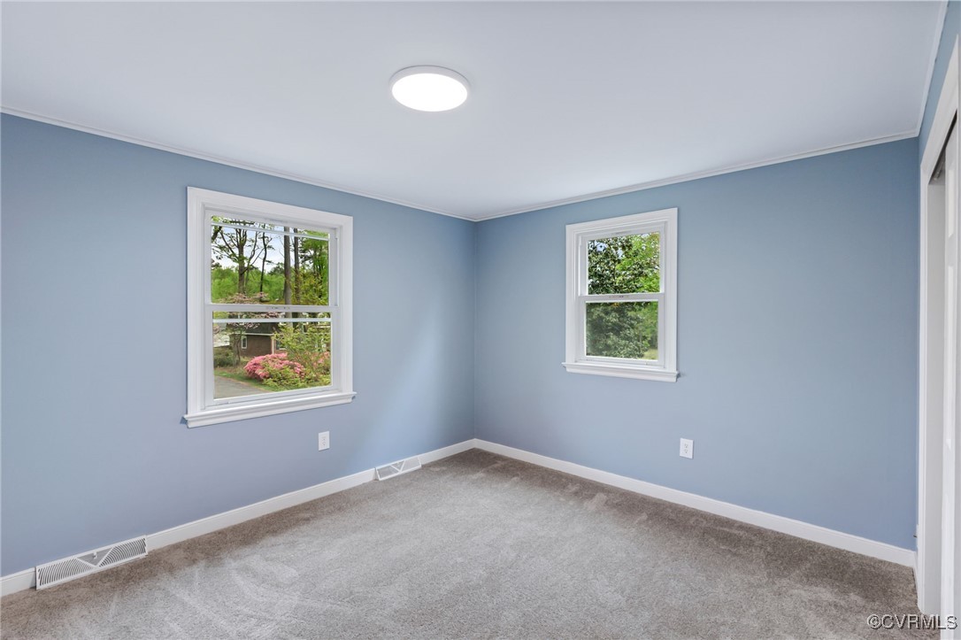 9232 Groomfield Road Chesterfield, VA 23236 - Photo 24 of 50 an empty room with a window