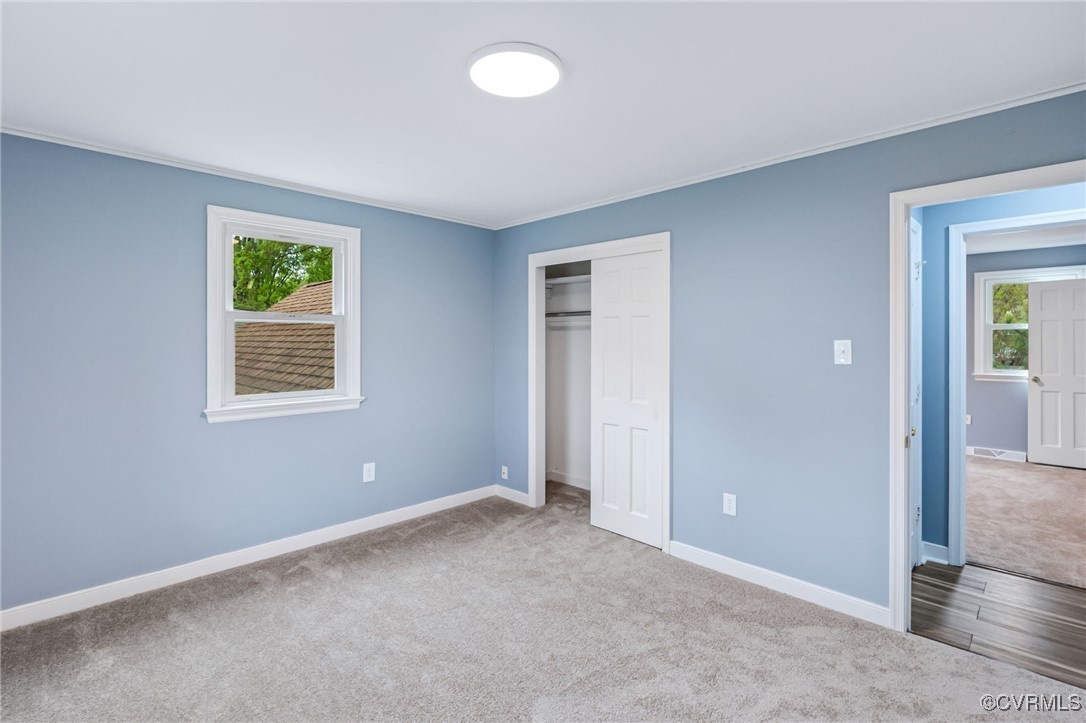 9232 Groomfield Road Chesterfield, VA 23236 - Photo 25 of 50 an empty room with windows and closet