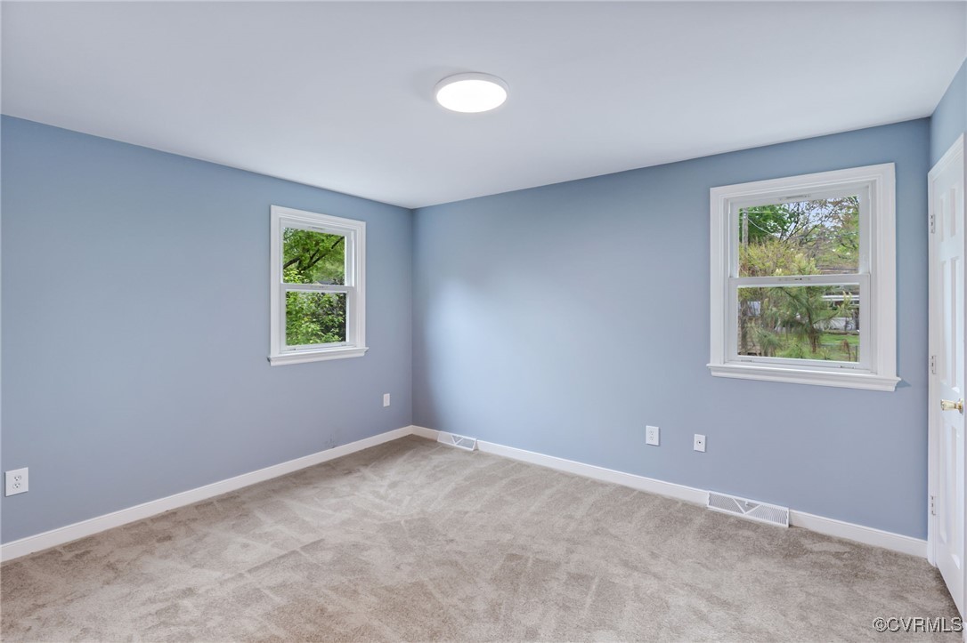 9232 Groomfield Road Chesterfield, VA 23236 - Photo 27 of 50 an empty room with a window