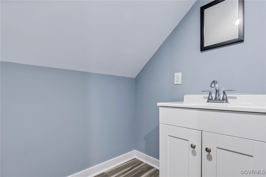 9232 Groomfield Road Chesterfield, VA 23236 - Photo 31 of 50 a bathroom with a sink and vanity